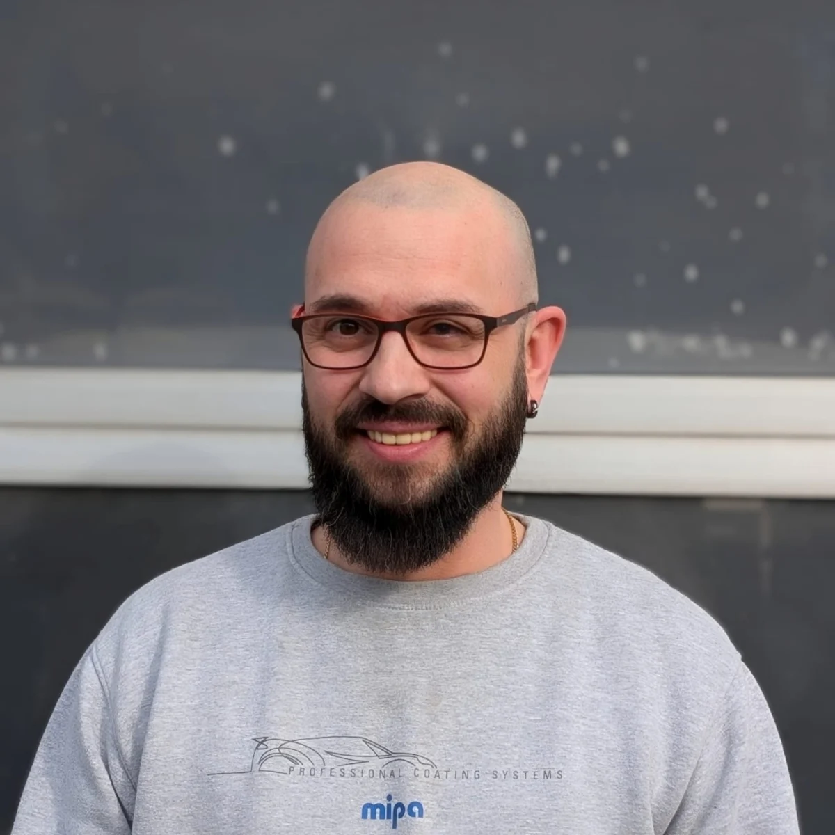 Portrait eines Fahrzeuglackierers von AM Karosseriebau in Höchstadt an der Aisch